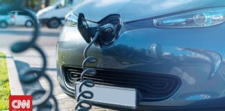 e5cb775b plugged charger into electric car charge station og.jpg