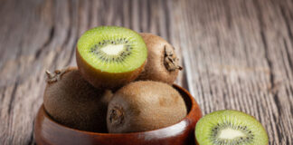 fresh kiwi cut into half put wooden bowl 618x412.jpg