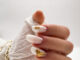 gold almond nails 869x1024.jpg