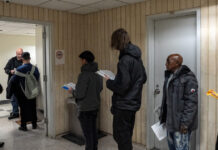 migrants reuters 1200x630.jpg