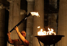 olympic flame reuters 1 1200x630.jpg