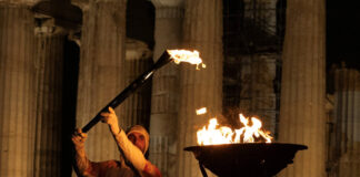 olympic flame reuters 1 1200x630.jpg