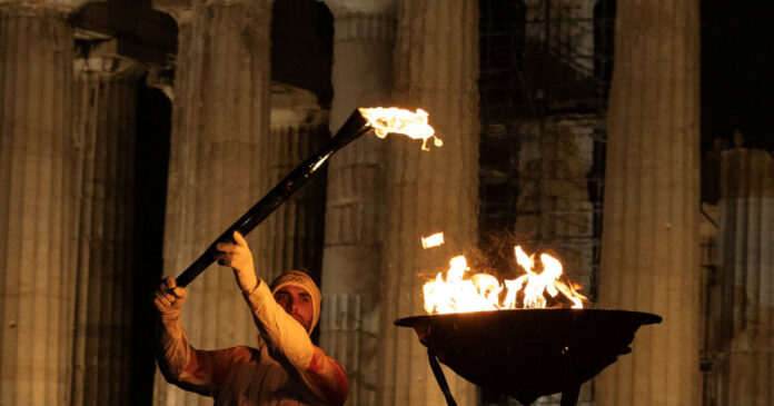 olympic flame reuters 1 1200x630.jpg