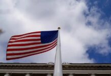 usa flag reuters scaled 1 1 1200x630.jpg