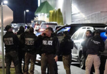 usa police reuters 1200x630.jpg