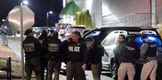 usa police reuters 1200x630.jpg