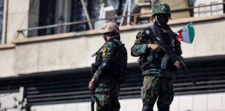 iran police reuters 1200x630.jpg