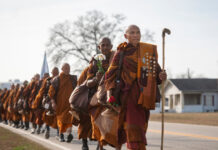 buddhist monks accosiated 1200x630.jpg