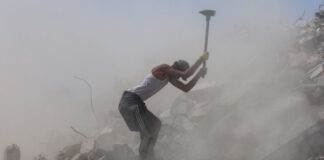 gaza worker reuters 1200x630.jpg