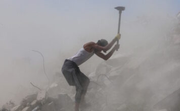 gaza worker reuters 1200x630.jpg