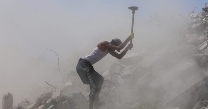 gaza worker reuters 1200x630.jpg
