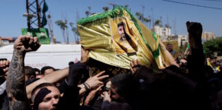 hezbollah funeral fighter reuters 1200x630.jpg