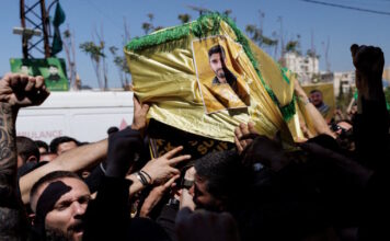 hezbollah funeral fighter reuters 1200x630.jpg