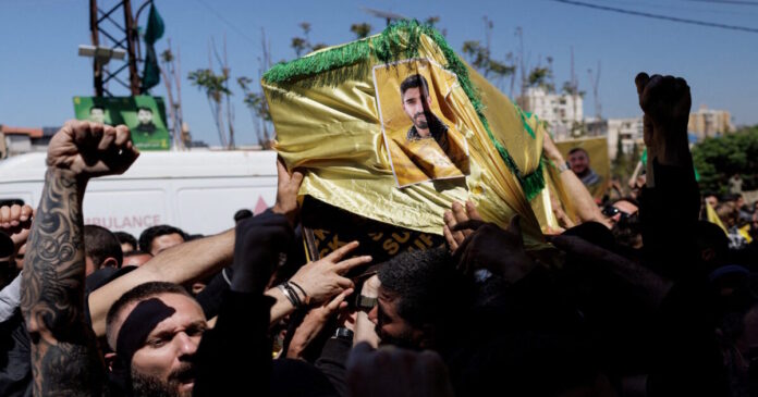 hezbollah funeral fighter reuters 1200x630.jpg