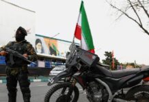iran police reuters 1200x630.jpg