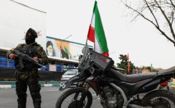 iran police reuters 1200x630.jpg