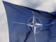 nato flag reuters 1200x630.jpg