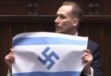 Πολωνία: Ακροδεξιός βουλευτής έδειξε σημαία του Ισραήλ με ναζιστική σβάστικα μέσα στη Βουλή polonos vouleytis 1 1200x630.jpg