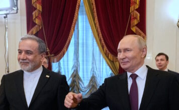 putin aragchi reuters 1200x630.jpg