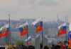 russia soldiers flags reuters 1200x630.jpg