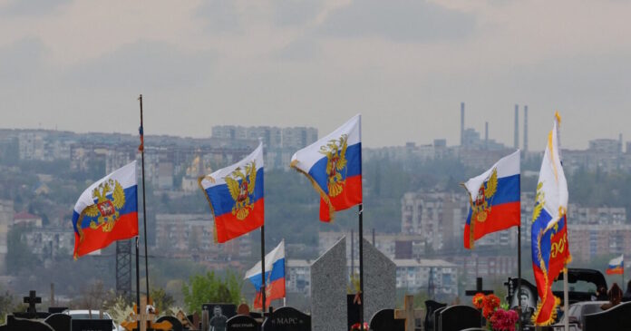 russia soldiers flags reuters 1200x630.jpg