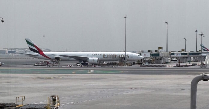dubai airport reuters 1200x630.jpg