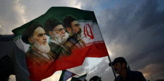 iran flag reuters 1200x630.jpg