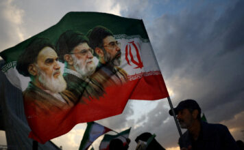 iran flag reuters 1200x630.jpg