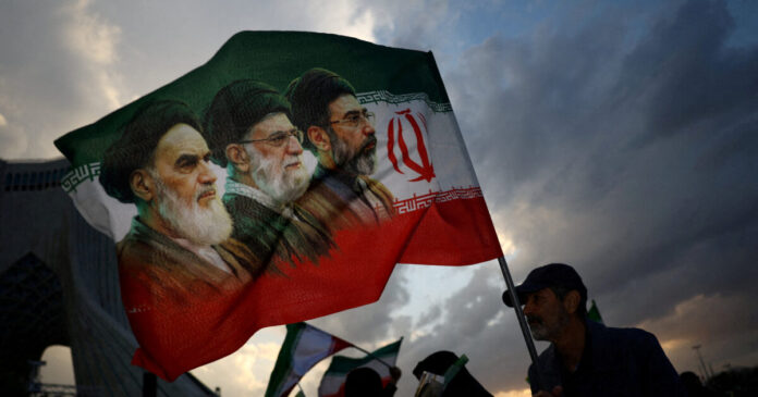 iran flag reuters 1200x630.jpg