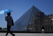 louvre kausonas reuters 1200x630.jpg